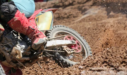 Fotobehang Motocross rider increase speed in track © toa555