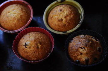 Baked muffins closeup. Photo can be used as a whole background.