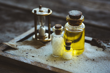 Globulis Naturheilkunde mit besonderer Lichtstimmung und Sanduhr