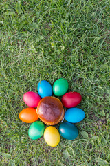 colored Easter eggs on the grass