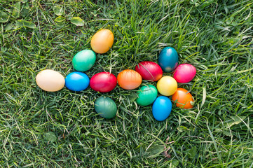 Fototapeta na wymiar colored Easter eggs on the grass