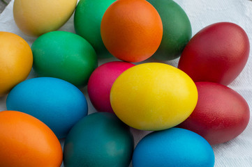 colored Easter eggs on the grass