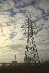 The utility pole. Electrical power transmission lines.