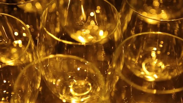 Closeup of many empty glasses. Real time full hd video footage.