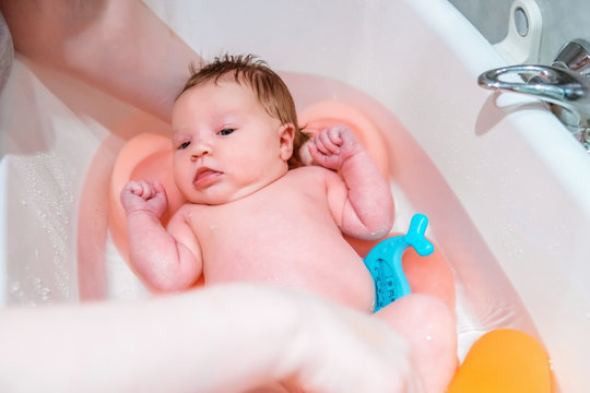 Bathing A Newborn Baby.