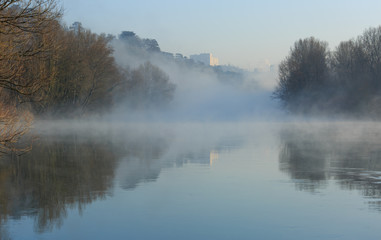 Morning fog over the Rhone river near Lyon, France.