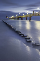 Ostseebad Seebrücke Zingst Langzeitbelichtung mit Wolken