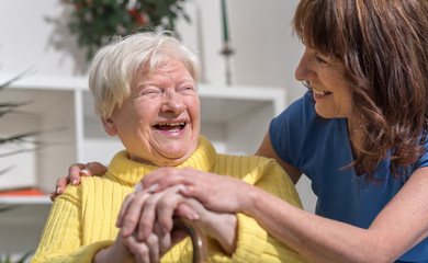 Portrait of happy grandmother with her daughter