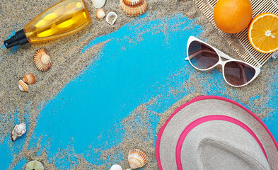 Naklejka premium Summer background. Beach vacation accessories flat lay on sand with seashells and azure colour texture. Resort mood and relax holiday. 