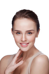 Beauty Cosmetics. Beautiful Smiling Woman Touching Skin