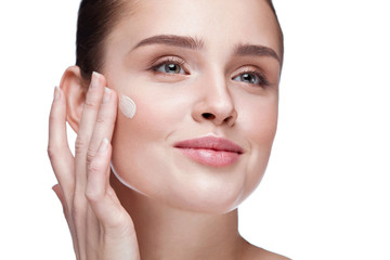 Face Makeup. Sexy Woman Applying Foundation Cream On Skin