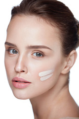 Skin Care. Sexy Girl With Foundation Or Cosmetic Cream On Face