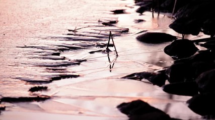 Frazil ice at lake shoreline in spring