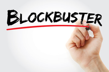 Hand writing Blockbuster with marker, concept background