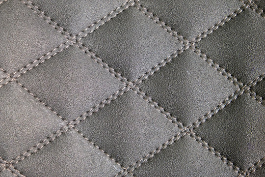 rough leather stitched thread diagonally