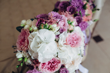 The wedding bouquets  standing  on the bed
