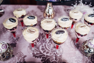 The different desserts standing on the banquet table