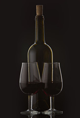 877440 Bottle of wine and vine glass