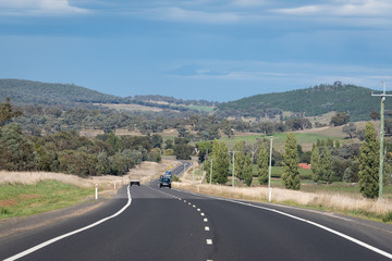 Fototapeta premium Beautiful road in autumn in the regional area of Australia.