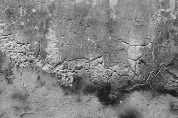 Wall fragment with scratches and cracks