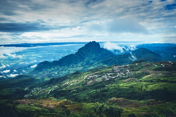 Mountain view Village in the valley In the morning Asia Tropical. Phutubberk Thailand