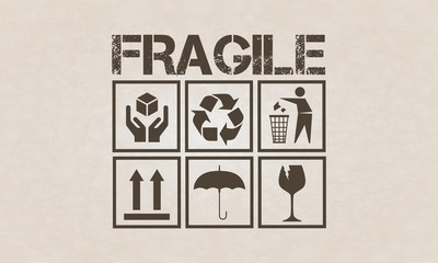 Fragile symbol set on brown cardboard