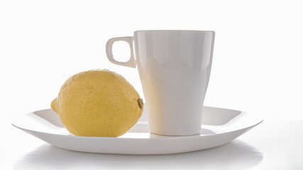 White crockery on a white background with reflections