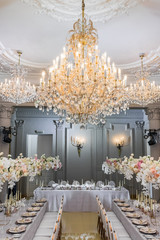 Bright lamps hang over dinner tables in the restaurant