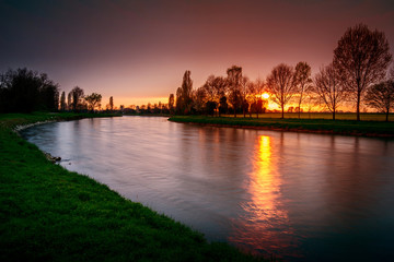 Fototapeta premium artificial canal at sunset