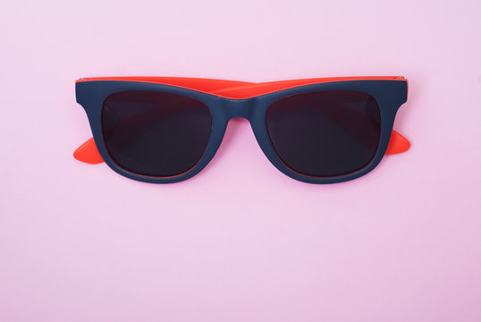 fashion sunglasses, pink background,