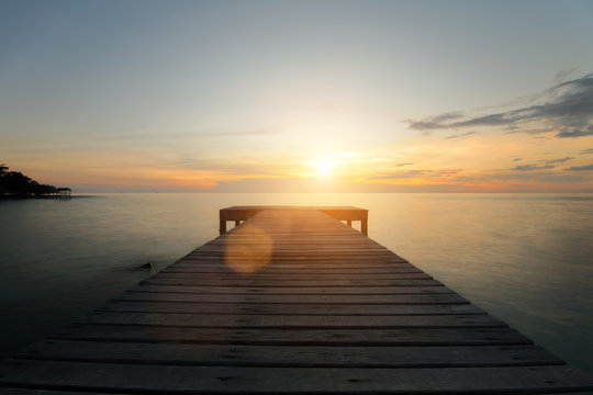 Fototapeta Wooden pier between sunset in Phuket, Thailand. Summer, Travel, Vacation and Holiday concept.