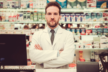 Fototapeta na wymiar Handsome pharmacist at work