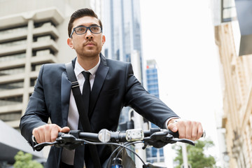 Young businessmen with a bike