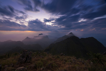 Fototapeta na wymiar View from the highest mountain peak of Chiang Dao with beautiful cloudy sunset twilight sky, Chiang mai, Thailand