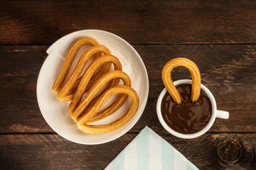 Photo of churros con chocolate, traditional Spanish dessert