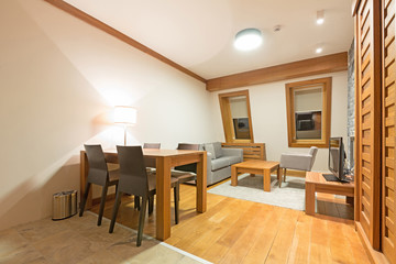Mountain hotel apartment interior, living room