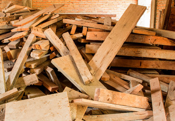 Wood chips are combined heap from the use for construction.