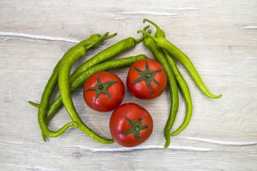 Natural tomatoes, green peppers and aubergines, vegetable paintings in different concepts, intestinal tomatoes and peppers, fresh tomatoes and green peppers,
