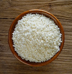 Japanese rice on wooden background