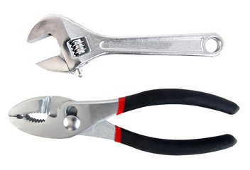 Pliers and wrench. Isolated.