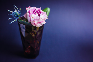 Dark violet glass with pink rose and blue cone