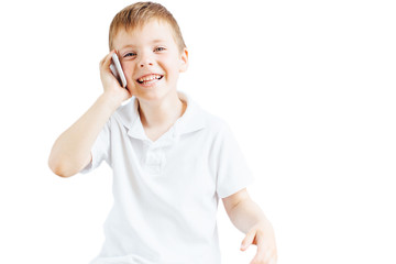Little boy listen music and talk on phone with white background