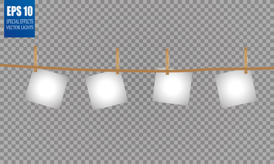 White sheets of paper hang on a rope, holding a clothespin. On a transparent background.