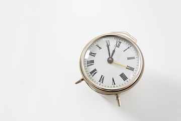 Alarm clock on white background