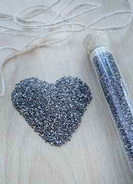 Chia seeds on wooden cutting board
