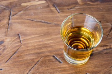 a stack of alcohol on wooden