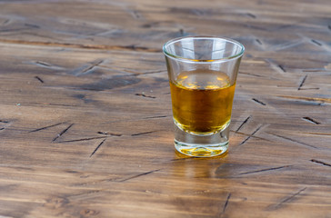 a stack of alcohol on wooden