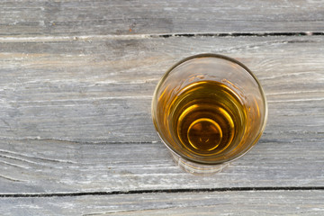 a stack of alcohol on wooden