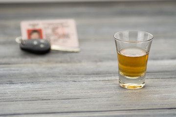 a stack of alcohol on wooden