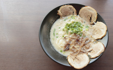 chashu pork ramen on wooden table